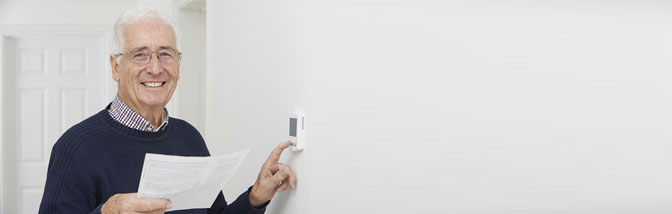 pensioner using thermostat